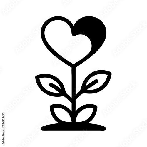 Heart shaped plant growing from seed sprout