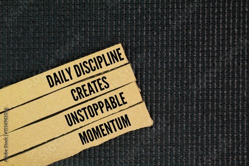 Slika na platnu Inspirational and motivational words or quotes about Discipline, ie daily discipline creates unstoppable momentum