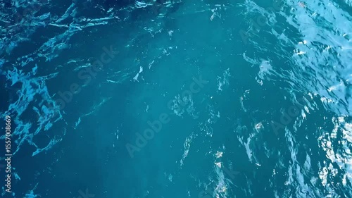 Calm ocean surface illustrated with serene blue colors and gentle waves reflecting sunlight. Ideal for themes of peace, water textures, marine life, or relaxation, conveying tranquility and unspoiled 