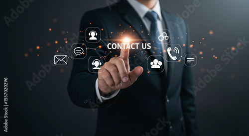 Man in Black Suit Touching Virtual Contact Us Icons on Dark Background Representing Customer Service and Online Support with Communication Technology