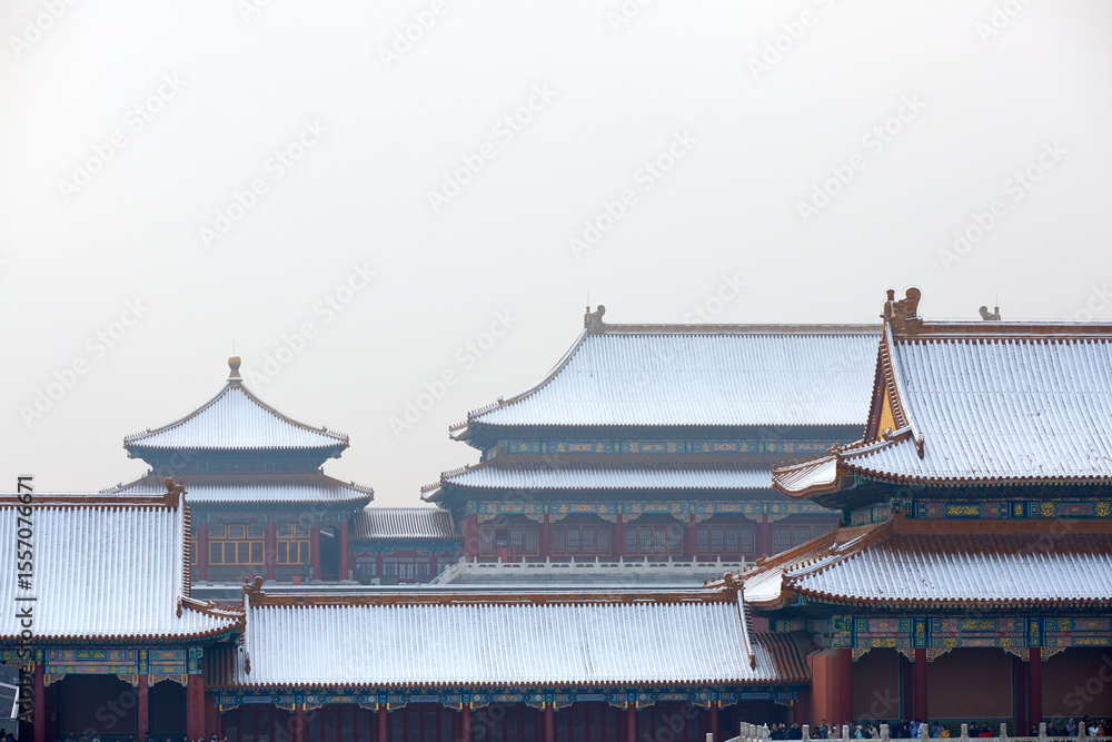 Naklejka premium Snowscape of ancient architecture in the Forbidden City, Beijing, China.