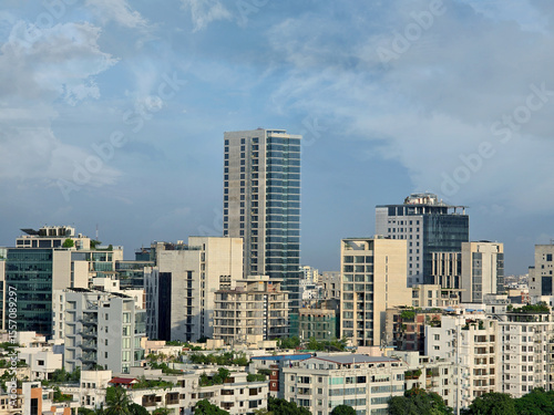 Dhaka city skyline with modern buildings and clear blue sky, urban architecture and cityscape view of Bangladesh capital. High angle view of Dhaka city residential and financial buildings at sunny day