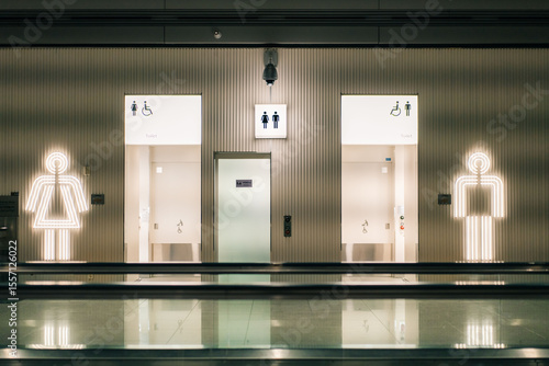 Seoul, South Korea - 16 may 2025 Toilets icon. Public restroom signs with a disabled access symbol. Interior of airport terminal