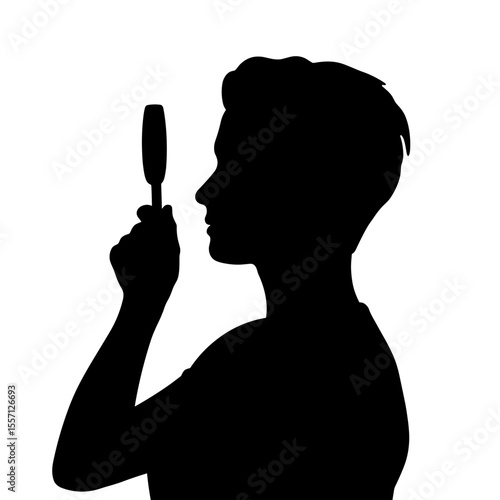 Person silhouette holding magnifying glass. Profile silhouette of curious child examining object with magnifying glass.