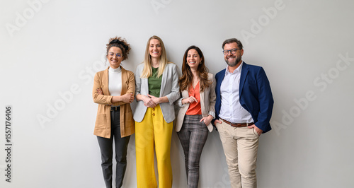 Tableau sur toile Portrait of confident business entrepreneurs standing side by side and smiling a