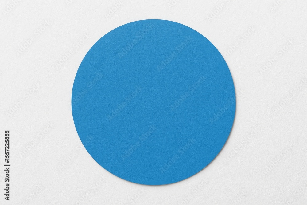 Minimalist abstract design with a blue circle on a white background, viewed from above in a flat lay style Minimalist abstract design with a blue circle on a white background, viewed from above in a flat lay style