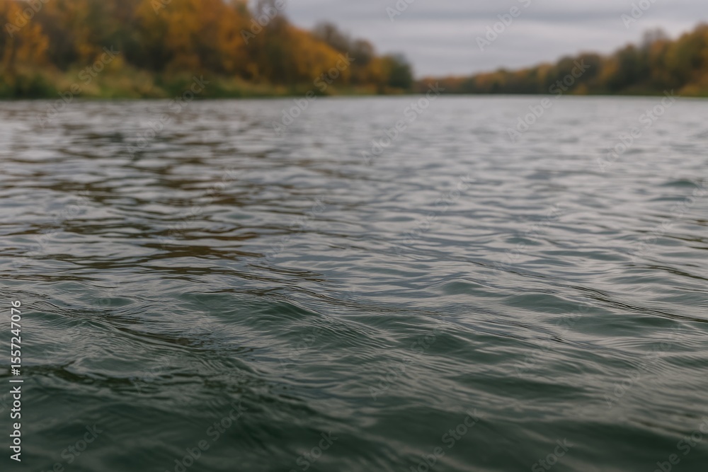 Fototapeta premium Image of a water body with a river under overcast autumn skies