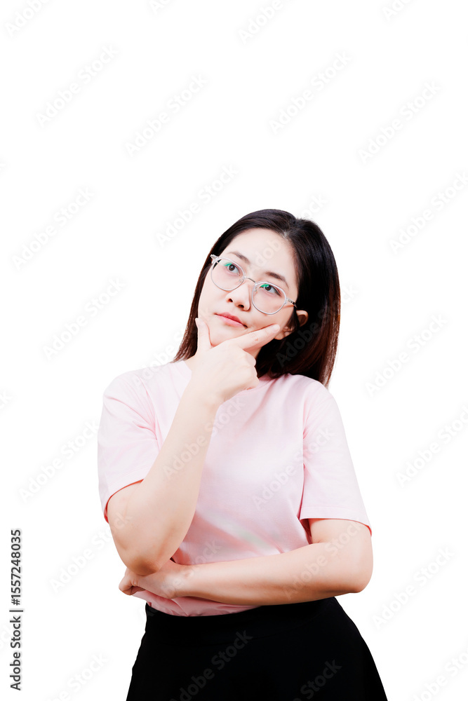 Asian young beautiful woman wearing glasses and a light pink shirt is thoughtfully looking upward with her hand resting on her chin. Asian young beautiful woman wearing glasses and a light pink shirt is thoughtfully looking upward with her hand resting on her chin.