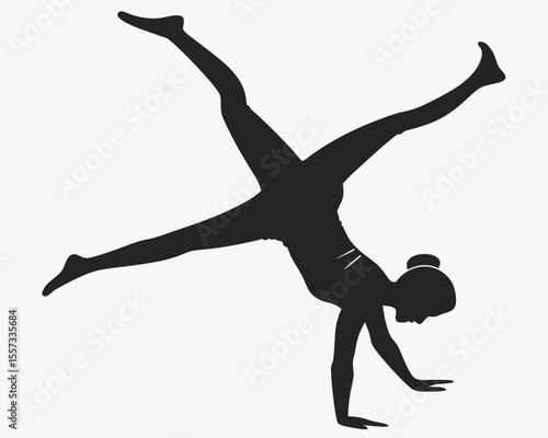 Black silhouette of a gymnast performing a handstand with legs extended elegantly