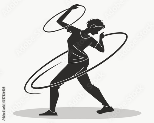 Silhouette of a woman playing with a hula hoop demonstrating grace and fitness