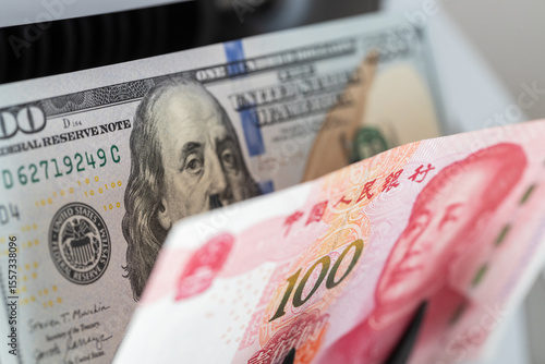 The exchange rate of the US dollar to the Chinese Yuan. Economic concept, Financial analysis. reductions and interest rate increases, Central market control