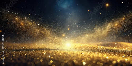 Fine golden dust settles on dark surface