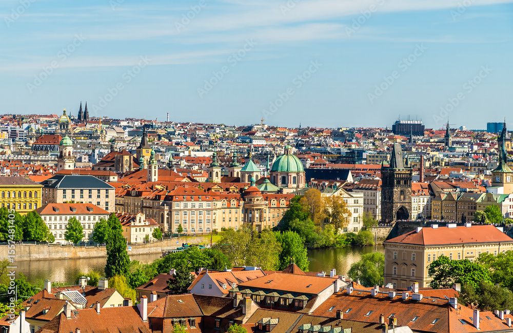 Obraz premium A view from the castle complex towards the banks of the Vltava river in Prague in springtime