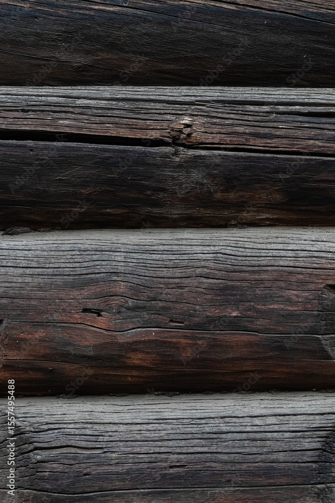 Obraz premium The texture of weathered wooden planks showing a rustic background, close up view.