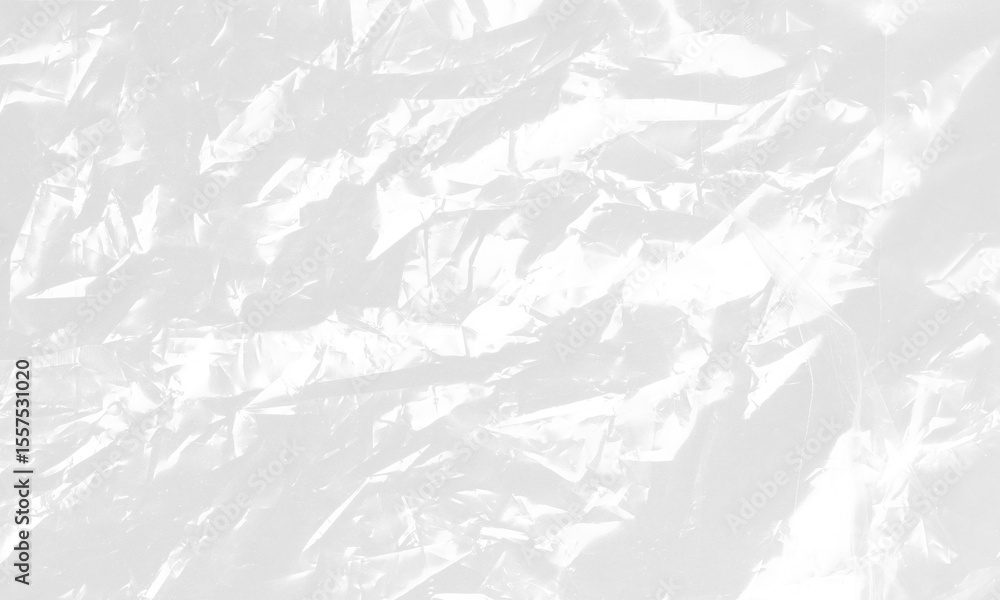 plastic transparent cellophane bag on white background. The texture looks blank and shiny. The plastic surface is wrinkly and tattered making abstract pattern plastic transparent cellophane bag on white background. The texture looks blank and shiny. The plastic surface is wrinkly and tattered making abstract pattern