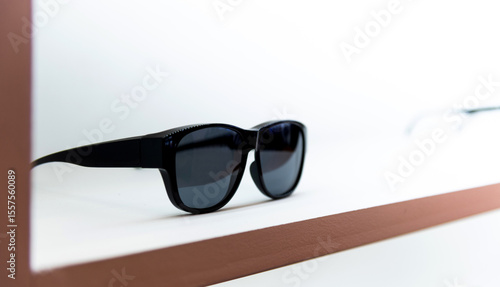 Black sunglasses is displayed in the store