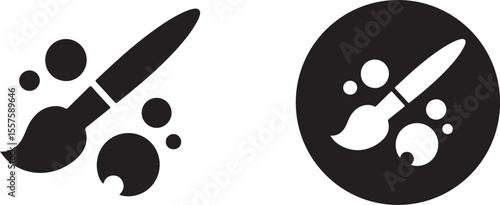 Black paint brush with ink splatters icon isolated on white background