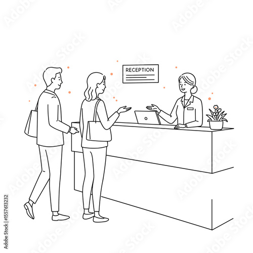 Receptionist talking to couple at front desk