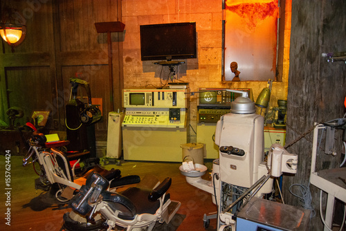 Eerie Vintage Medical Equipment in Dimly Lit Room