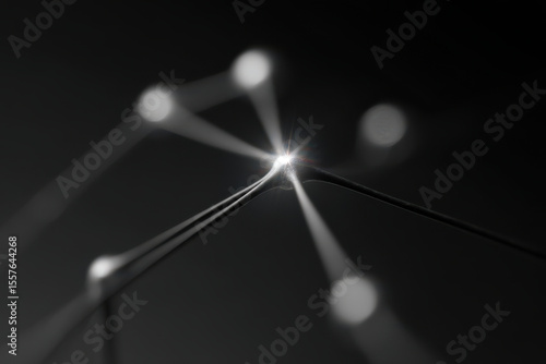 minimalist photograph of abstract neural impulse transmission scheme focusing on single ultrabright element against