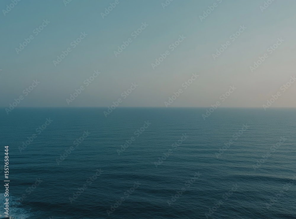 Fototapeta premium Serene Blue Ocean Horizon Under a Clear Sky