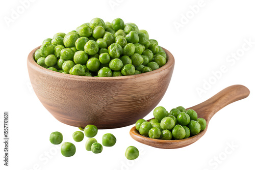 Fresh green peas in a wooden bowl and spoon
