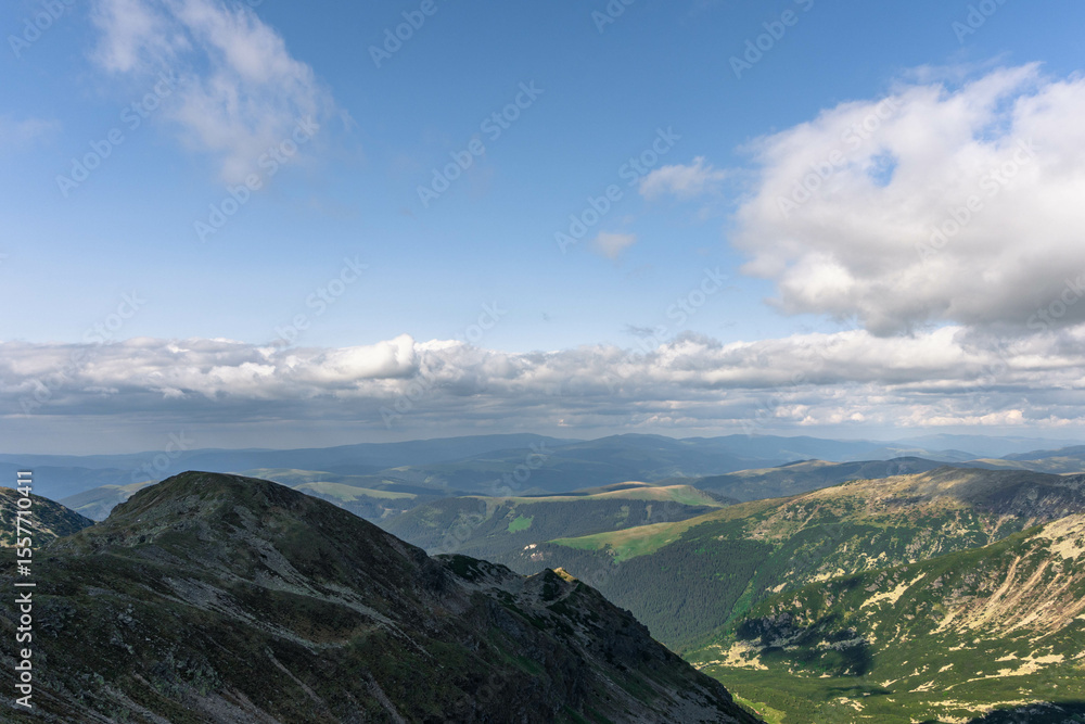 Fototapeta premium mountain landscape with clouds carpathians with lakes down