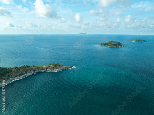 Wallpaper Mural Aerial view A rocky promontory that juts out into the sea at Laem Promthep Cape viewpoint. Promthep cape is the most popular viewpoint in Phuket.Man island in front Promthep viewpoint. Torontodigital.ca