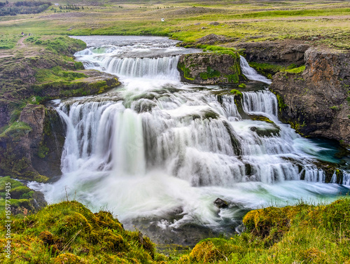 Aerial drone view of Fosslaug waterfall, Iceland