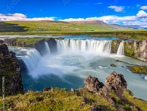 Godafoss waterfall with colorful sunset sky in summer at Iceland