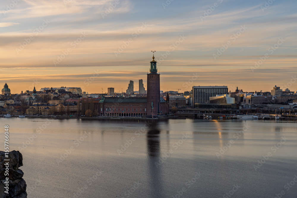 Fototapeta premium Stockholm City Hall and Old Town skyline reflecting at sunrise