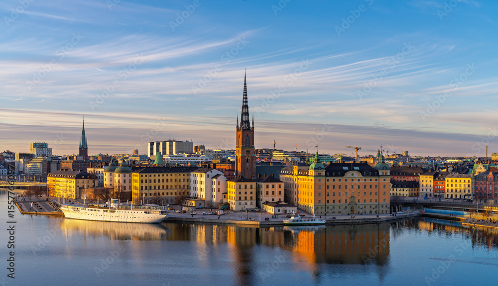 Historic buildings and Riddarholmen Church reflecting in Stockholm waters Historic buildings and Riddarholmen Church reflecting in Stockholm waters
