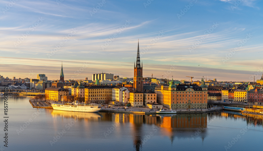 Historic buildings and Riddarholmen Church reflecting in Stockholm waters Historic buildings and Riddarholmen Church reflecting in Stockholm waters