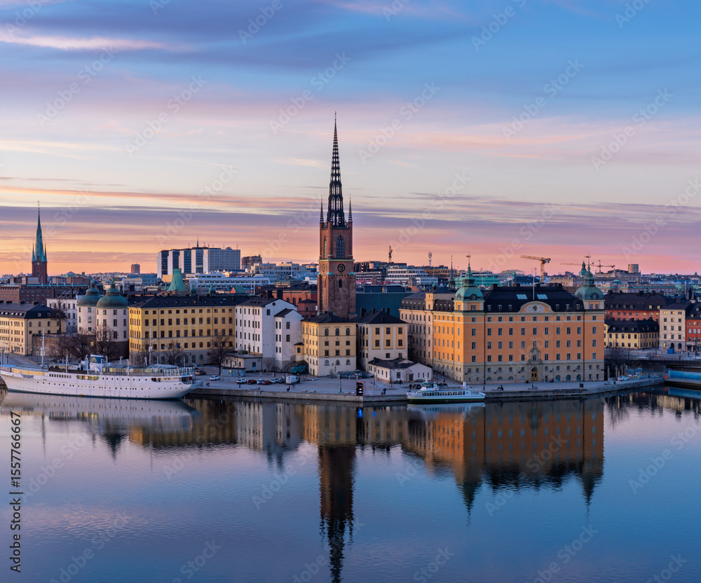Sunset cityscape of Stockholm with Riddarholmen and Old Town waterfront Sunset cityscape of Stockholm with Riddarholmen and Old Town waterfront