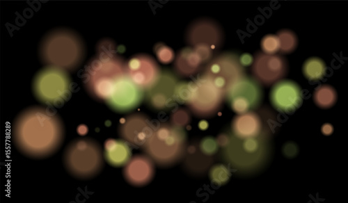 Multicolored blurred bokeh particles with violet, blue, pink hues floating on black background, creating festive or dreamy abstract composition.