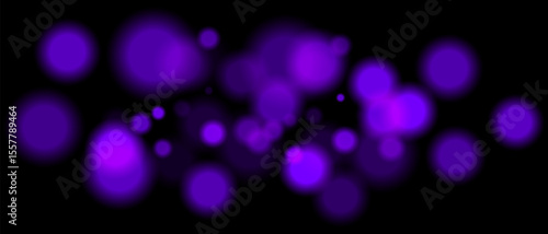 Purple blurred bokeh particles with varying size and opacity on black background. Abstract design element for festive or sci-fi scenes.