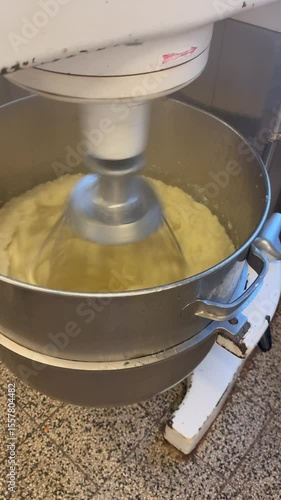 Industrial planetary mixer stirs boiled potatoes