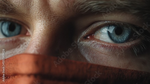 Wallpaper Mural A close-up shot of a person's face with a mask covering their features Torontodigital.ca