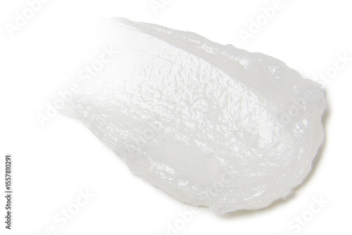 Fototapeta Narrow smear of white moisturizer on empty background