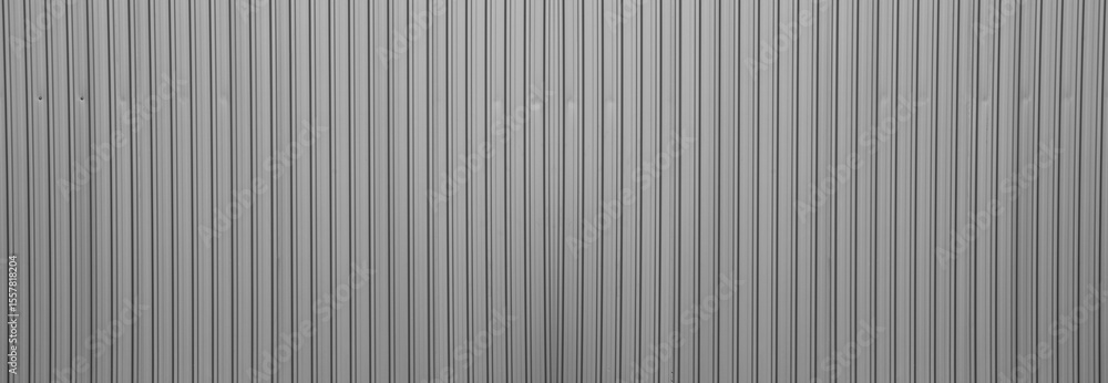 white silver grey gray Corrugated metal texture surface of fence wall. Warehouse Exterior Silver Building Wall Texture Background, Construction Material Backdrop Design White Aluminum Corrugated Metal white silver grey gray Corrugated metal texture surface of fence wall. Warehouse Exterior Silver Building Wall Texture Background, Construction Material Backdrop Design White Aluminum Corrugated Metal