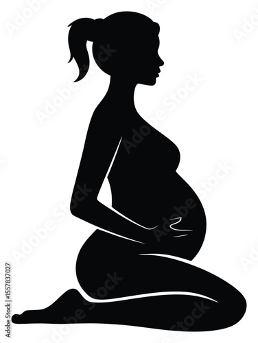 Silhouette of Pregnant Woman Kneeling, Tenderly Touching Her Belly, Profile View, Black and White