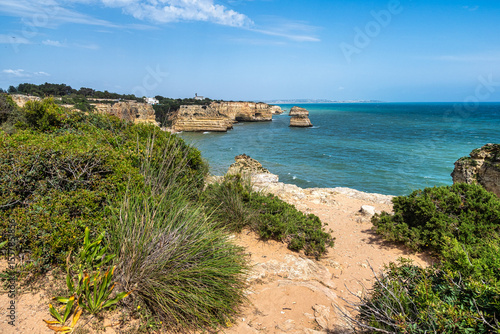 Praia da Marinha Beach among rock islets and cliffs seen from Seven Hanging Valleys Trail, Algarve, Portugal