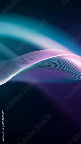 Abstract flowing light waves create mesmerizing motion with vibrant purple blue gradients transitioning smoothly across dark background forming elegant curved patterns