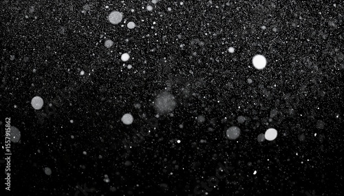 chaotic white star bokeh on black background falling blurry bokeh snow overlay starry sky white spot and drops abstraction