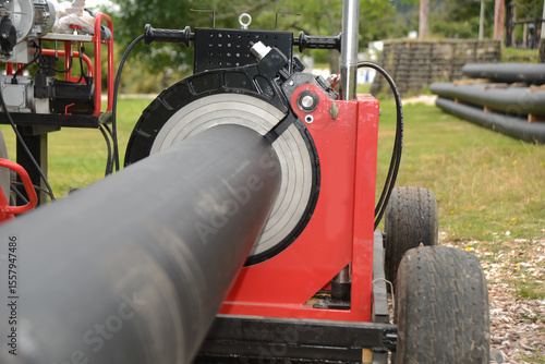 Welding plastic pipe for a hydro unit