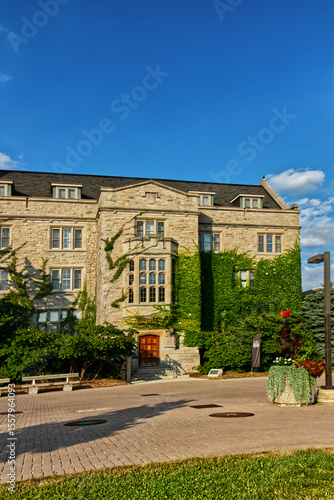 10 Aug 2024 - University of Guelph, ON, Canada. A section of the administrative building covered with Ivy leaves.