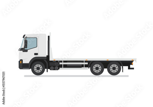 White flatbed truck with three axles viewed in profile