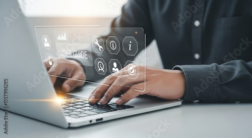Person typing on a laptop with a user guide interface overlayed on the screen in a modern office