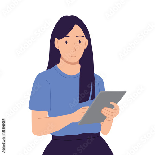 A smiling woman looking at the digital tablet