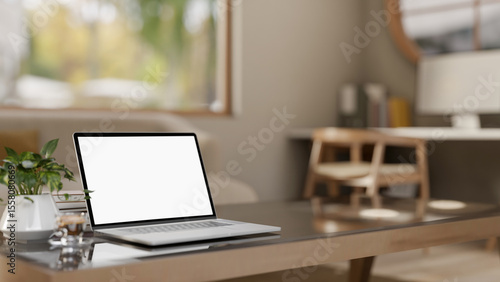 Wallpaper Mural White screen laptop with books and coffee cup on glass top wooden table in a bedroom or living room. Torontodigital.ca